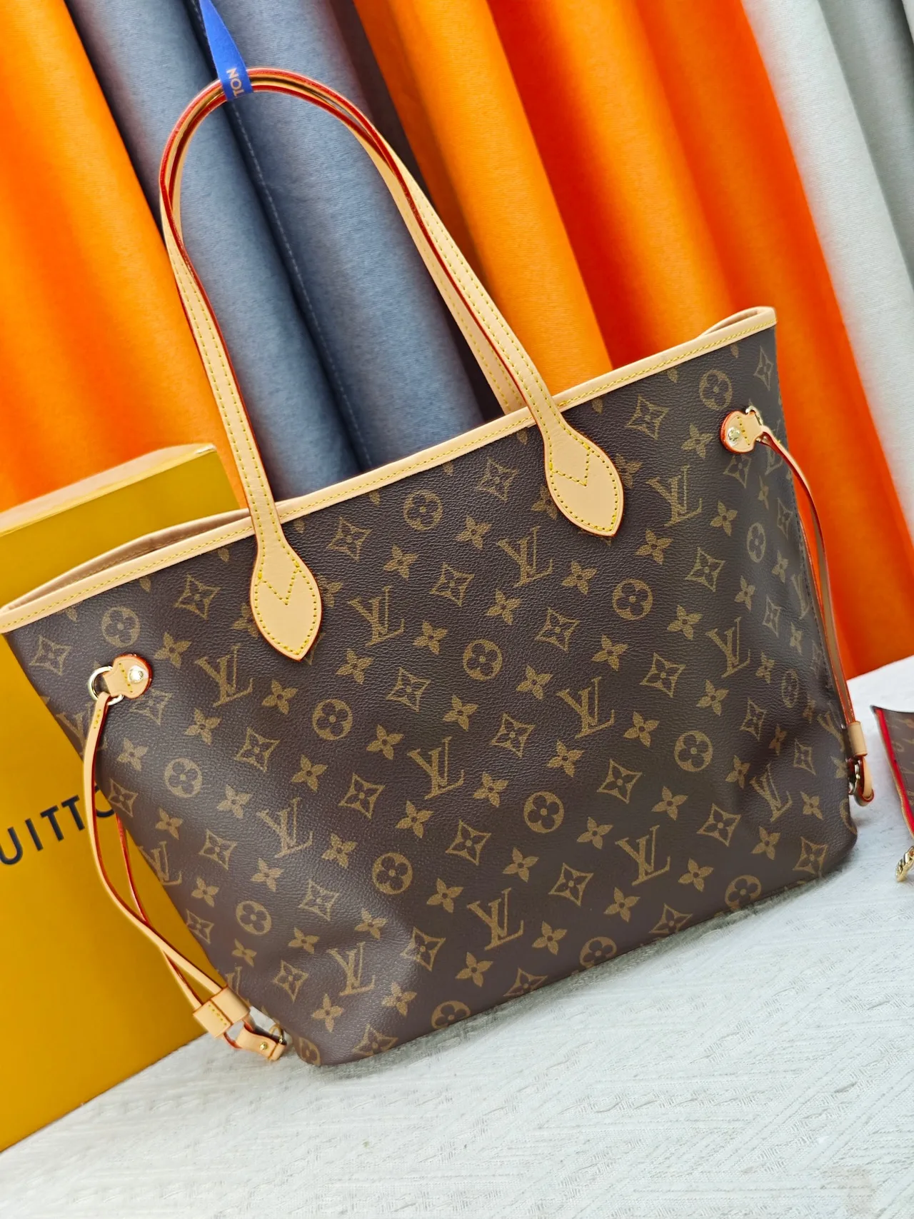 Louis Vuitton Neverfull Clutch in Brown · view 4