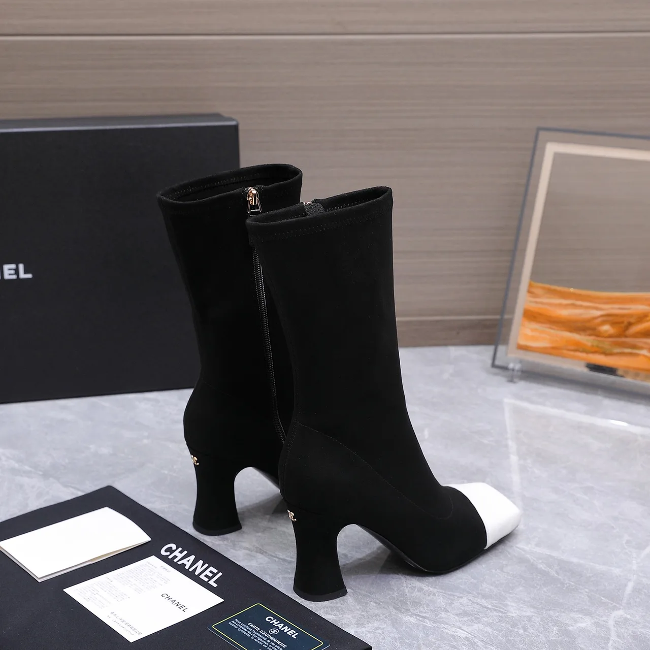 Chanel Cowhide Boots in Black · view 1