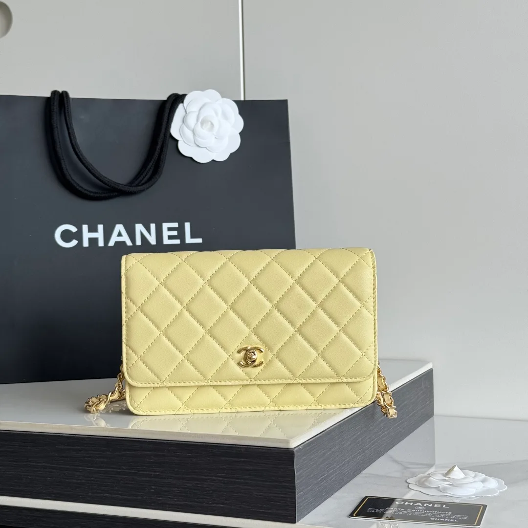 Chanel Calfskin Quilted Clutch in Yellow · view 1
