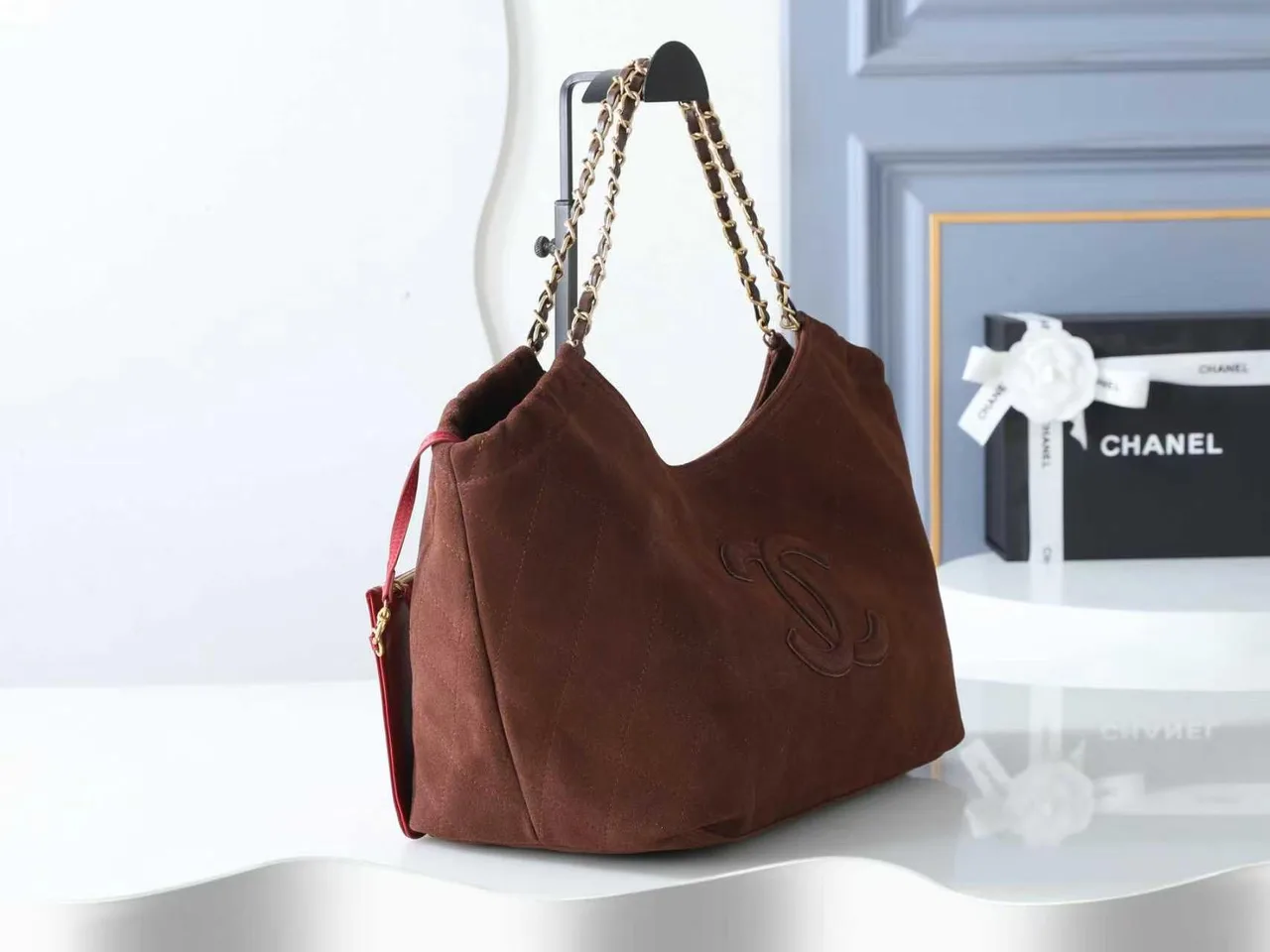 Chanel Quilted Suede-Look Hobo Bag in Brown · view 2