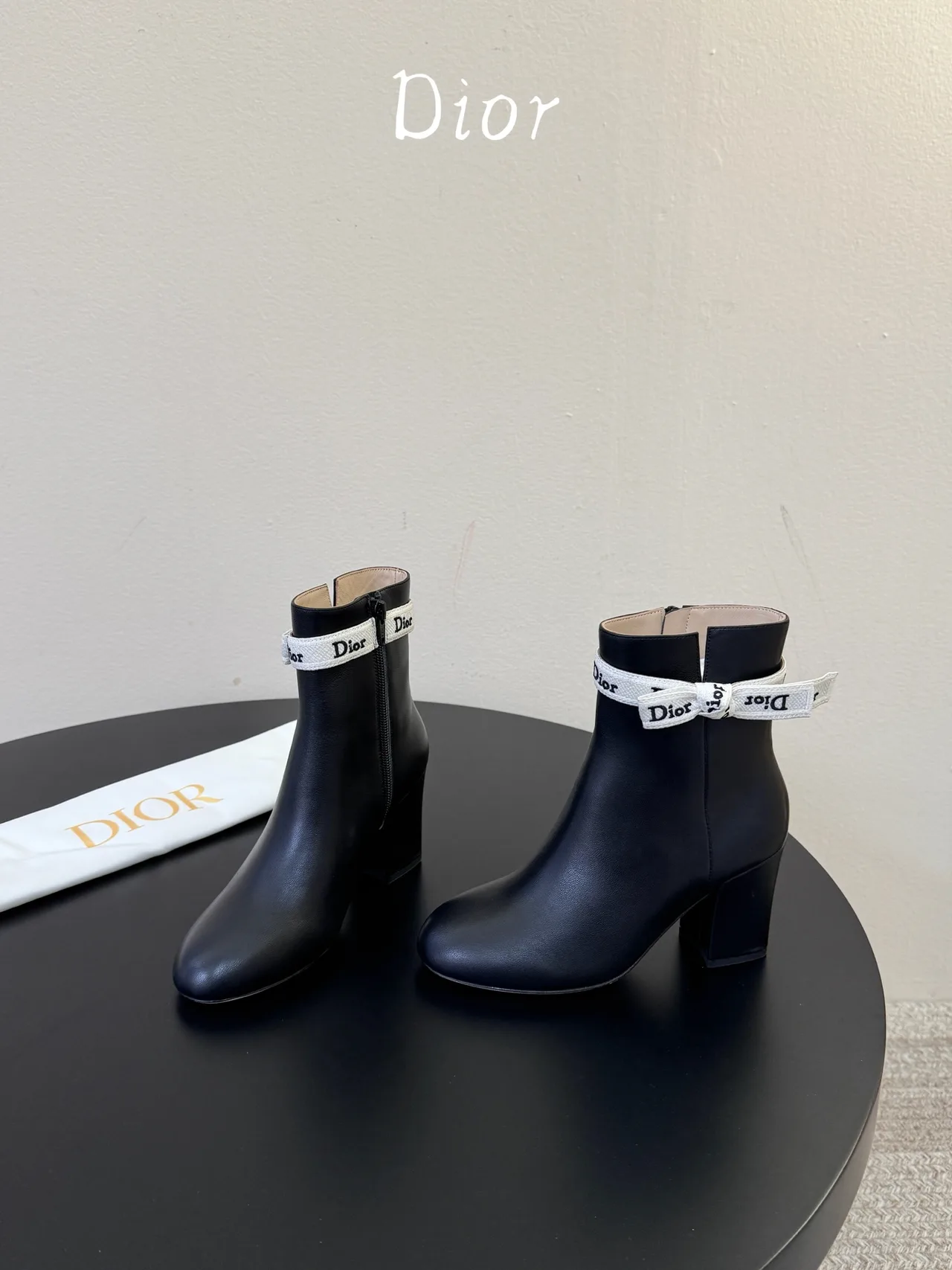 Dior Cowhide Glossy Ankle Boots in Black · view 1
