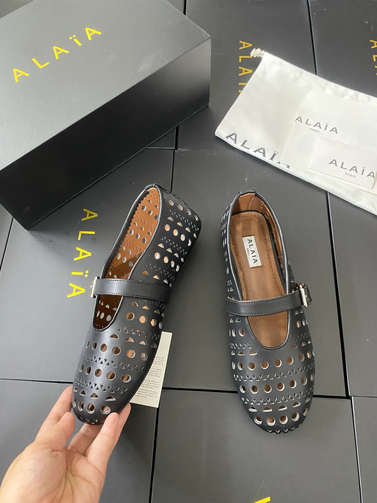 Alaia Cowhide Sheepskin Buckle Studded Mary Jane Flats in Black · view 5