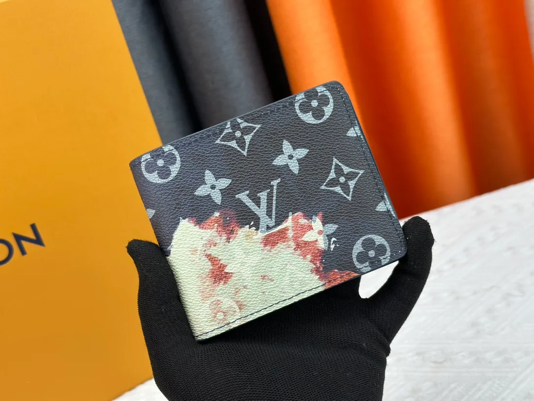 Louis Vuitton Canvas Wallet in Blue · view 1