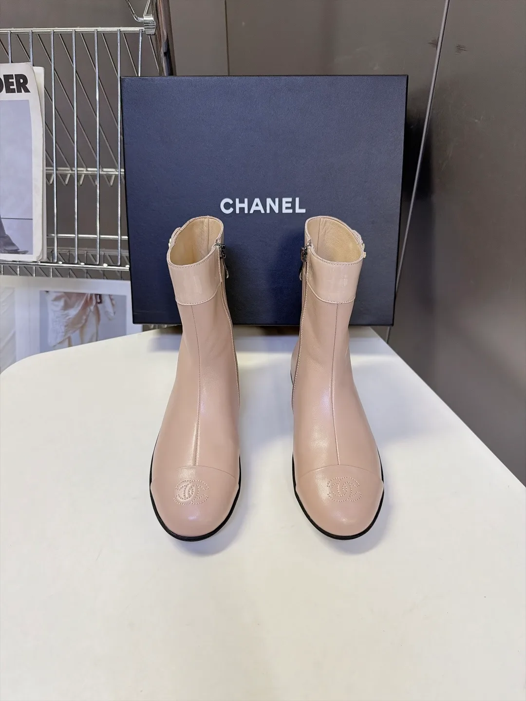 Chanel Calfskin Glossy Ankle Boots in Beige · view 1