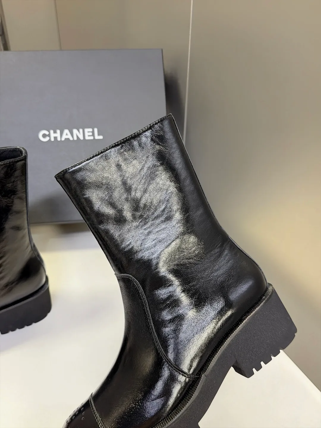 Chanel Cowhide Patent Leather Glossy Round-Toe Ankle Boots in Black · view 8