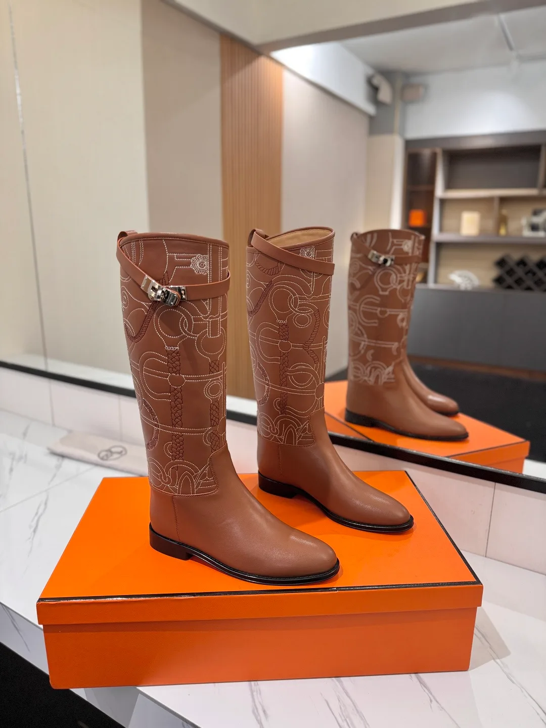 Hermes Cowhide Boots in Brown · view 1