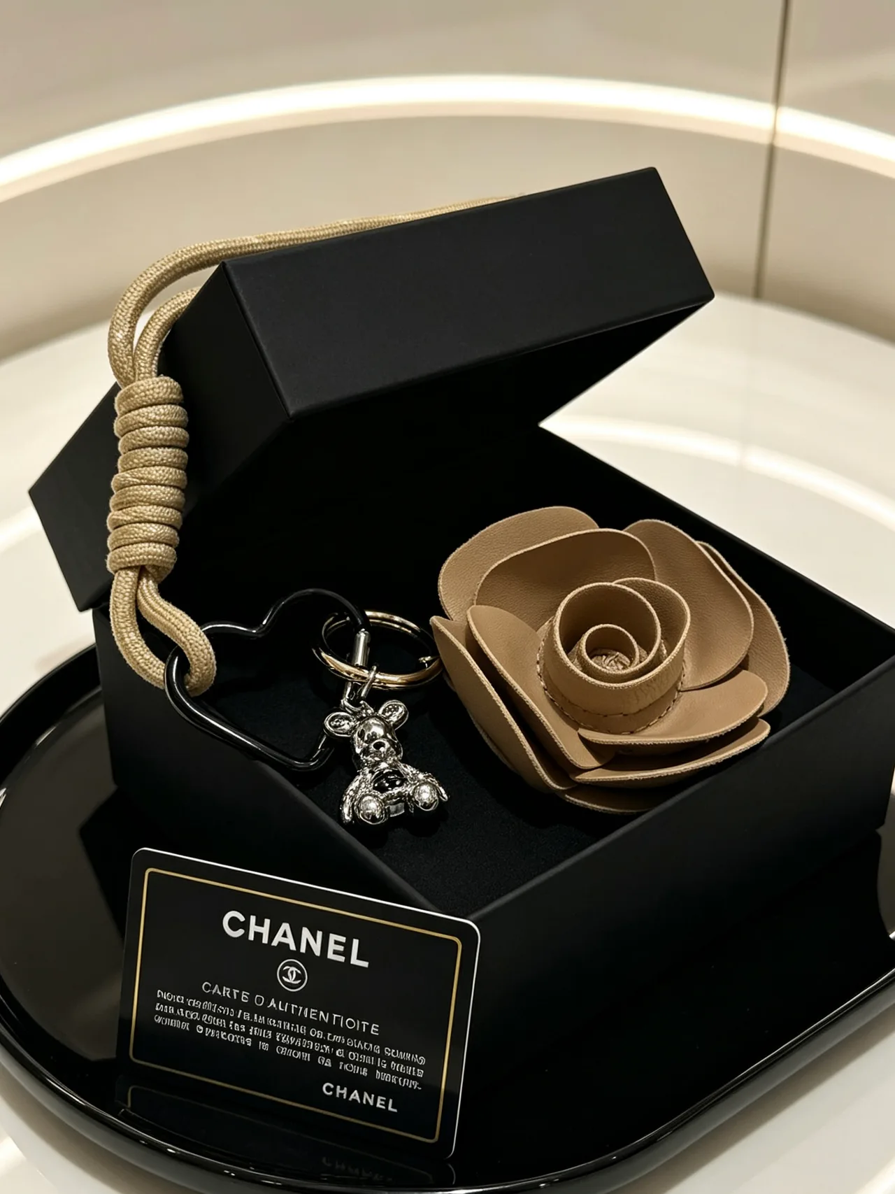 Chanel Woven Rose Keychain in Brown · view 3