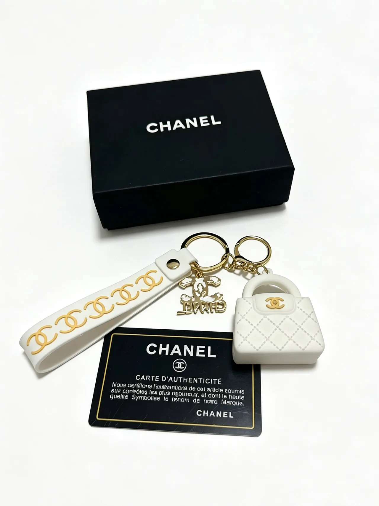 Chanel Quilted Mini Handbag Keychain in White · view 1