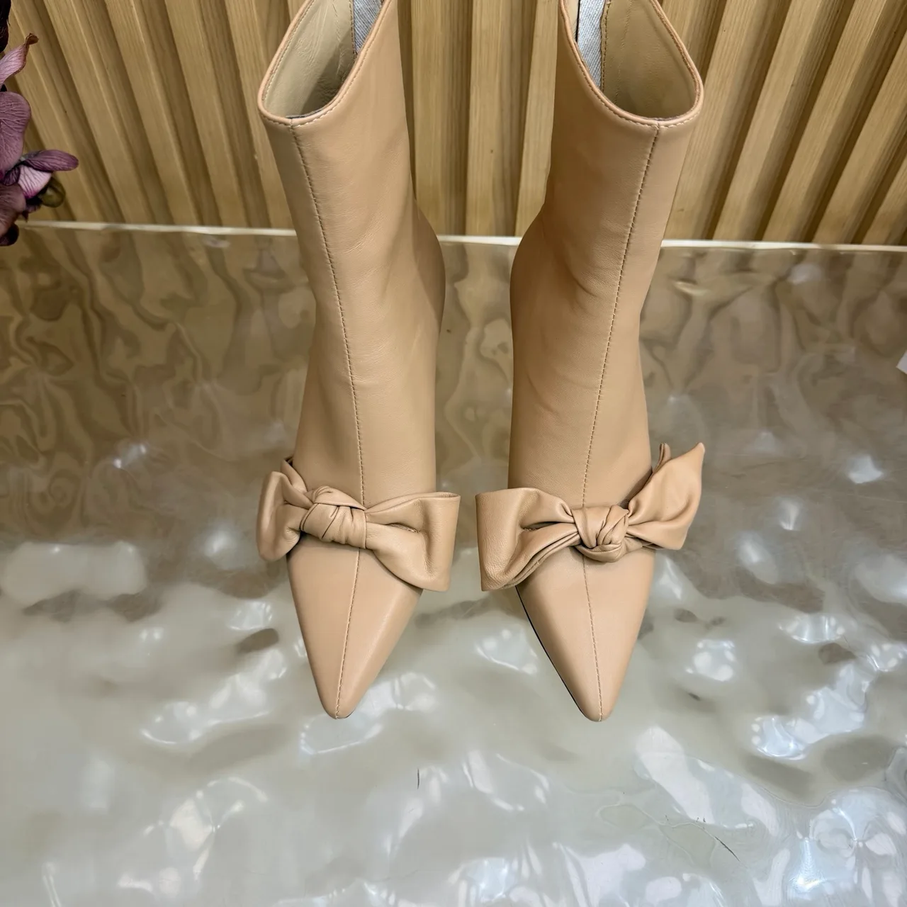 Jimmy Choo Cowhide Glossy Pointed-Toe Bow Ankle Boots in Beige · view 5