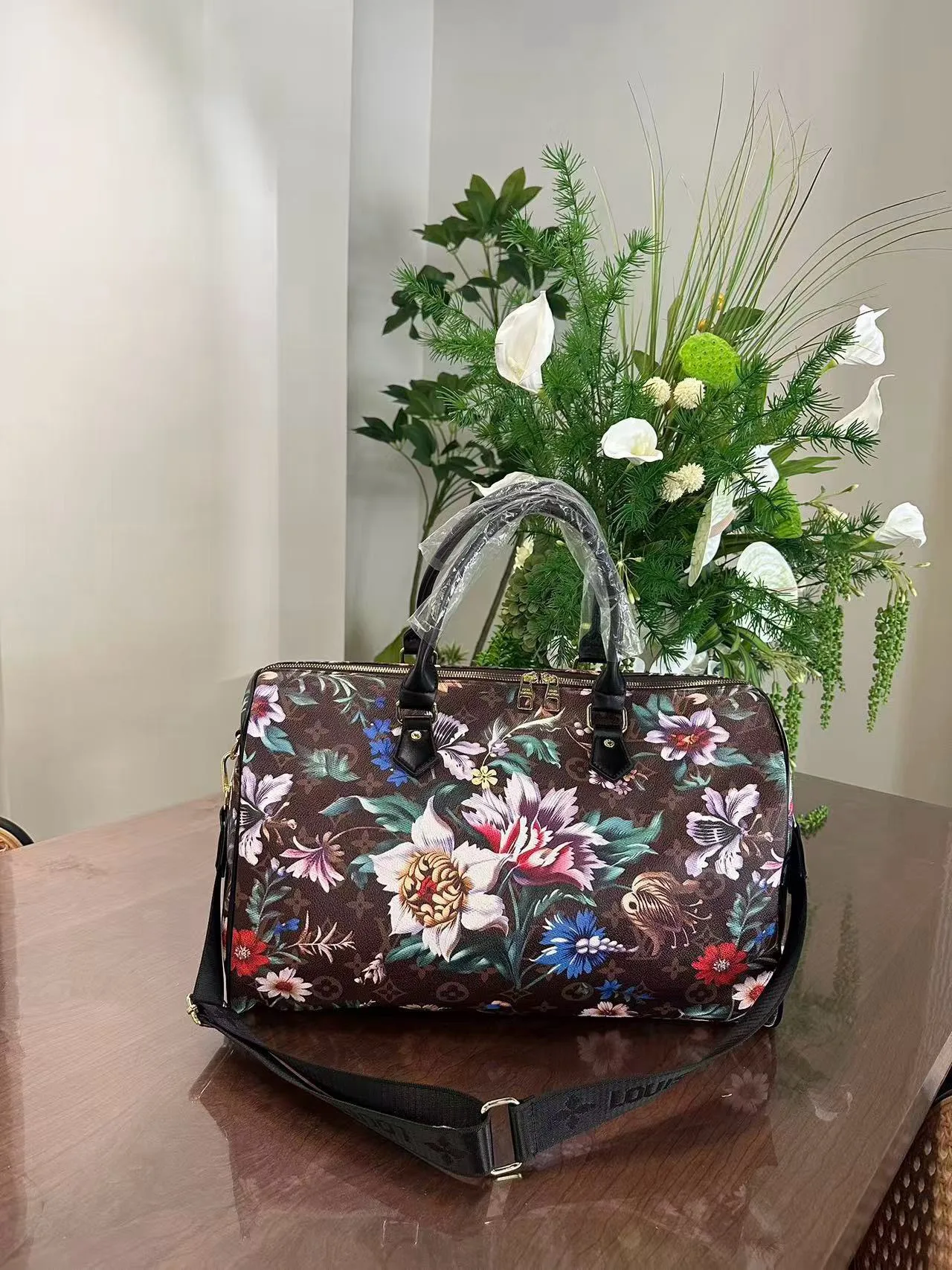 Louis Vuitton Floral Monogram Duffel Bag in Brown · view 3