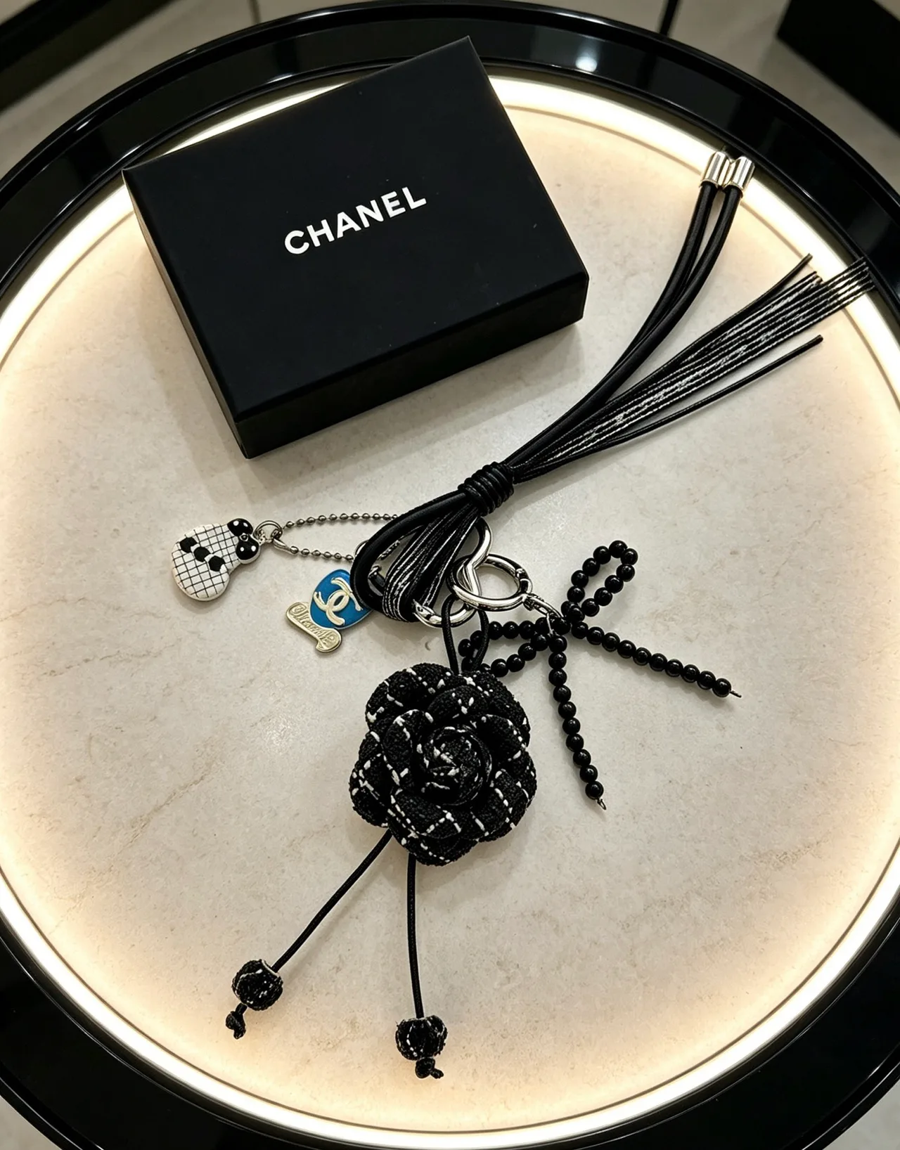 Chanel Woven Floral Tassel Keychain in Black · view 4
