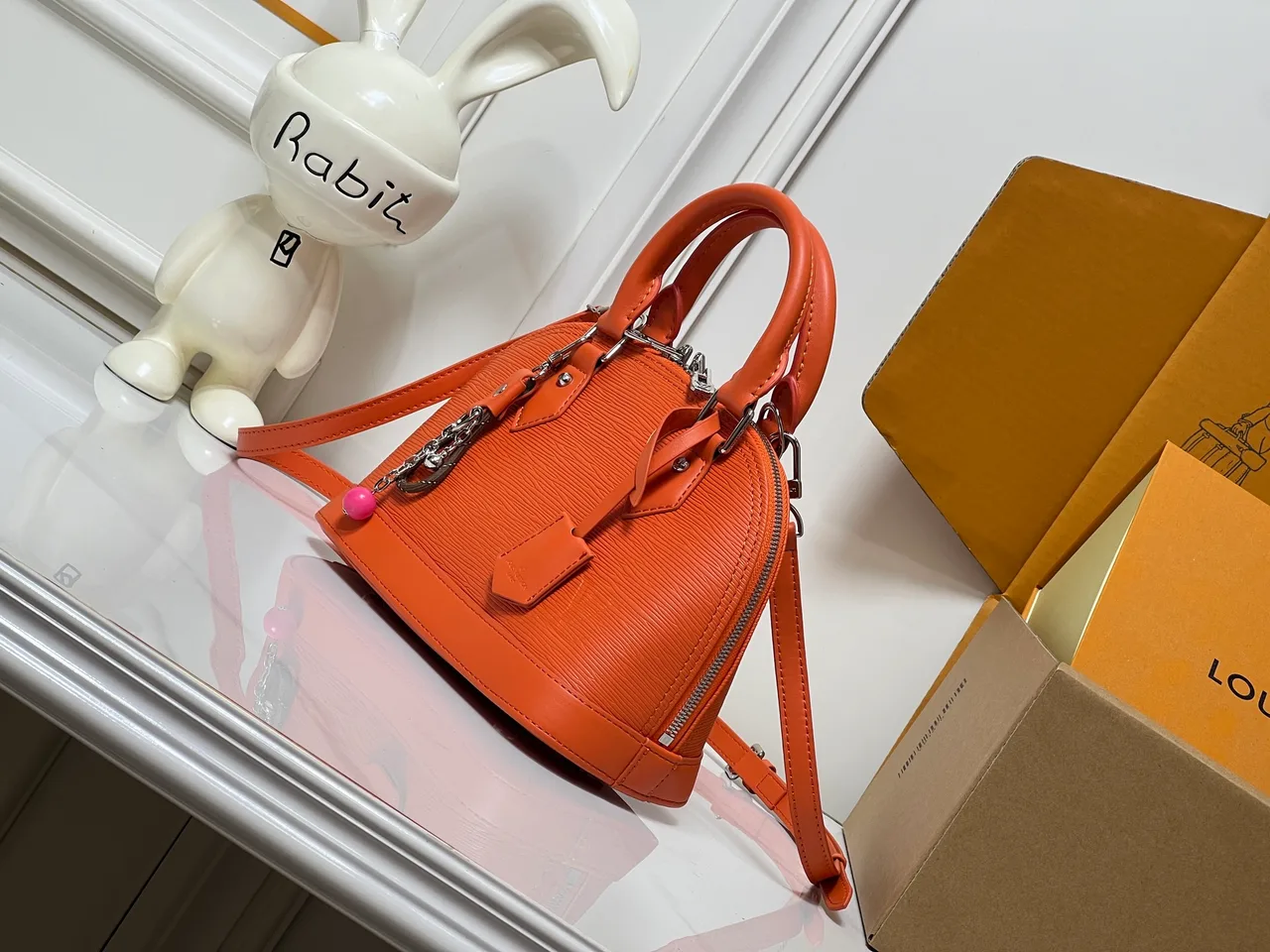 Louis Vuitton Leather Handbag in Orange · view 3
