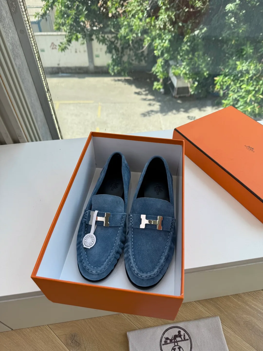 Hermes Calfskin Suede-Look Round-Toe Loafers in Blue · view 1