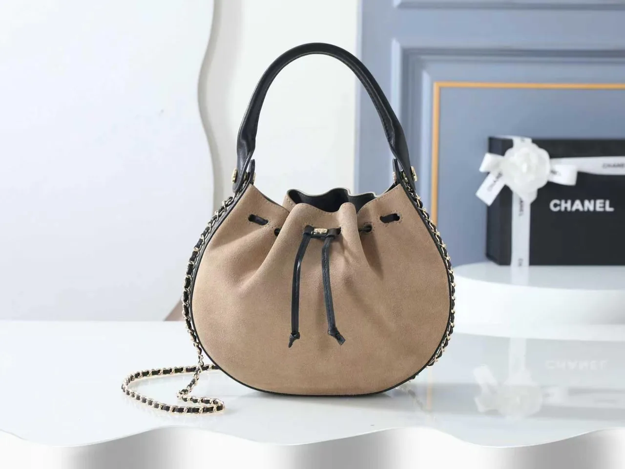 Chanel Drawstring Bucket Bag in Beige · view 1