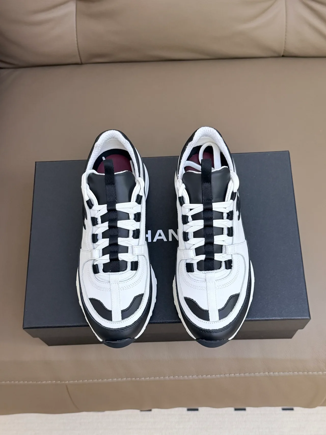 Chanel Cowhide Sheepskin Sneakers in White · view 1