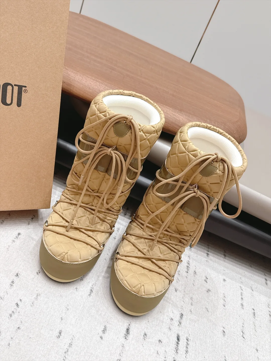 Moon Boot Lace-Up Quilted Snow Boots in Beige · view 1