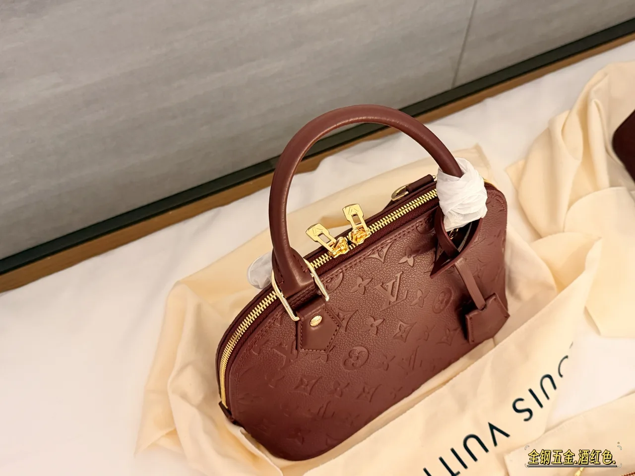 Louis Vuitton Quilted Handbag in Burgundy · view 3