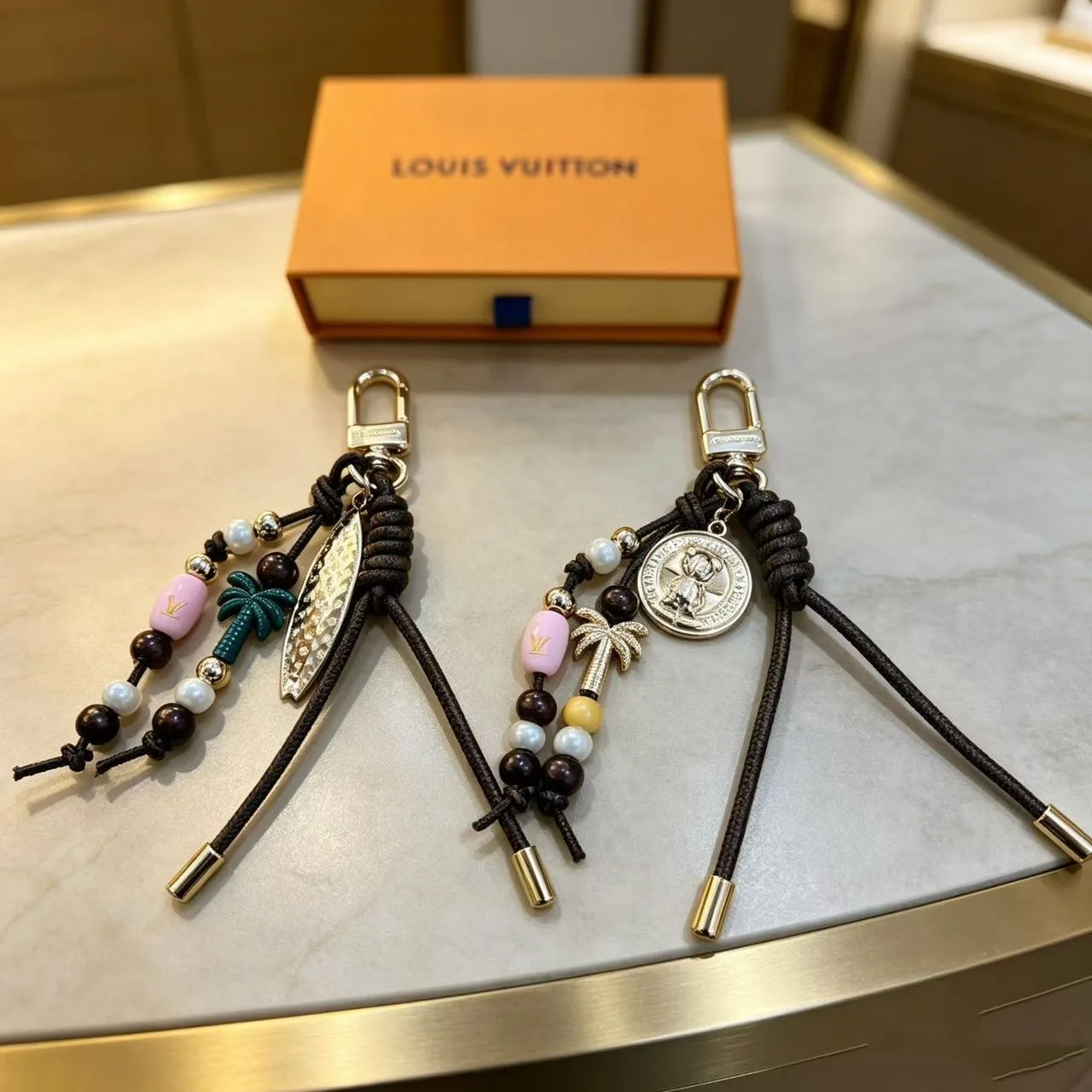 Louis Vuitton Beaded Wrist Strap Keychain in Black & White & Brown · view 2