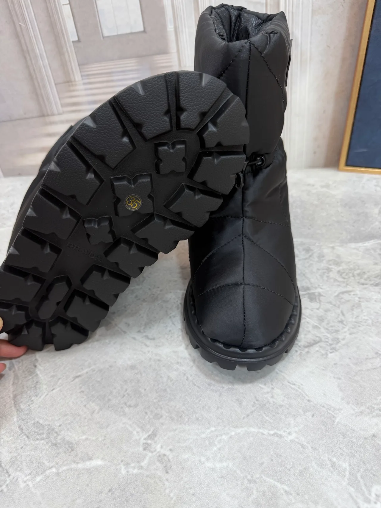 Prada Puffer Boots in Black · view 5