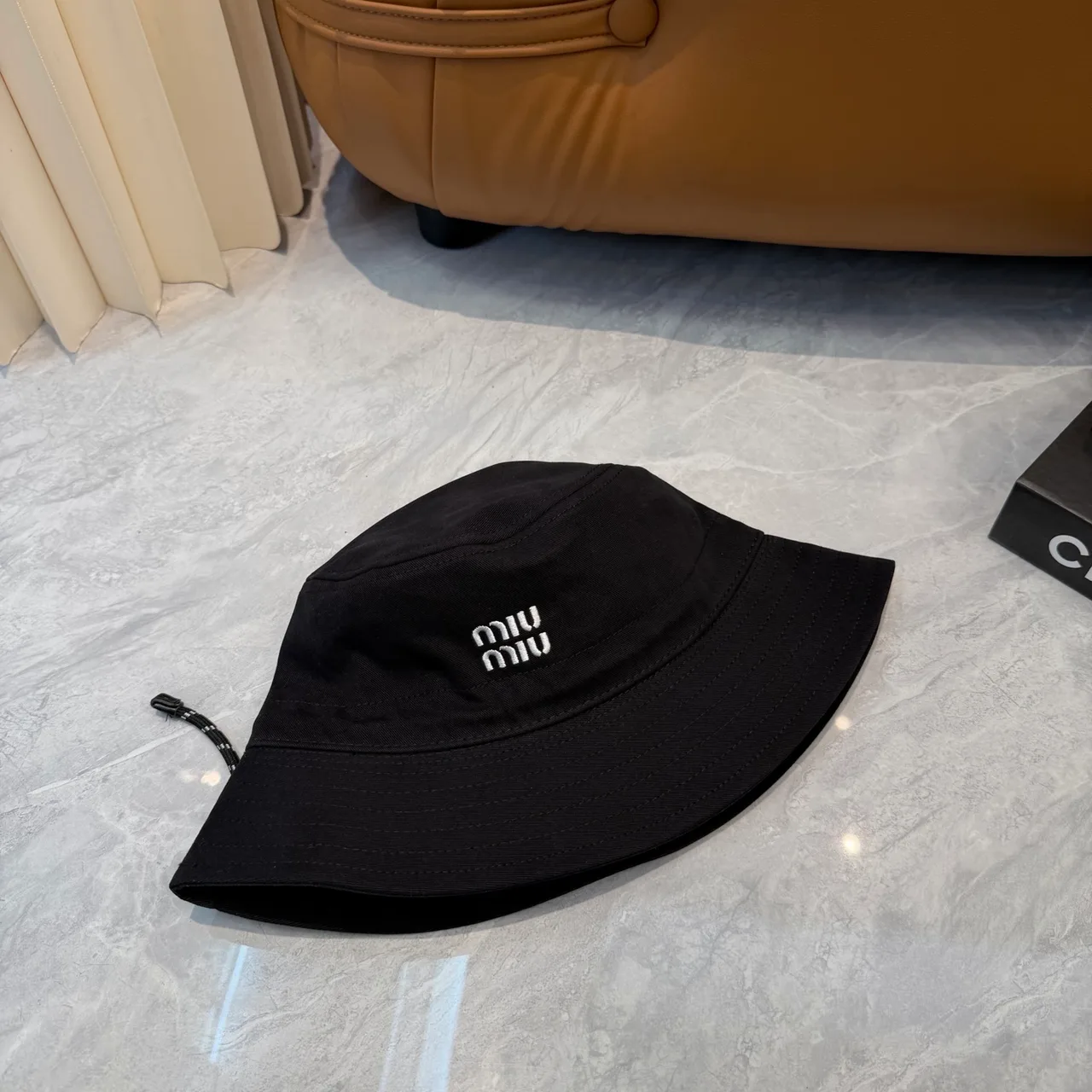 Miu Miu Embroidered Bucket Hat in Black · view 5