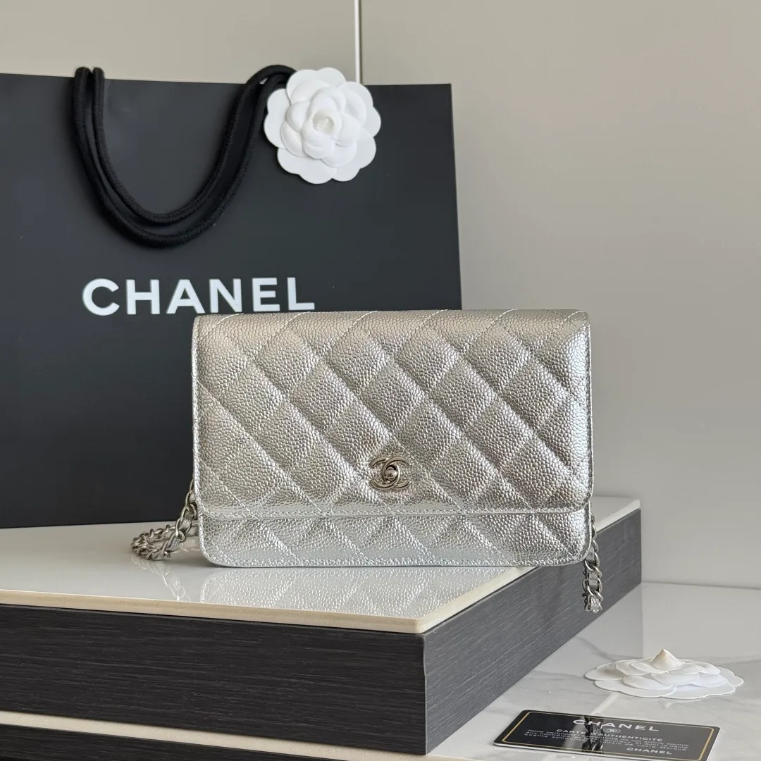Chanel Calfskin Quilted Glossy Clutch in Silver · view 1