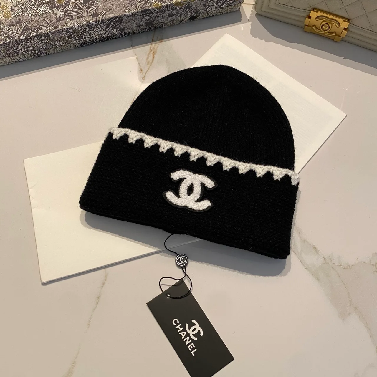 Chanel CC Beanie in Black / White / Brown / Grey · view 1