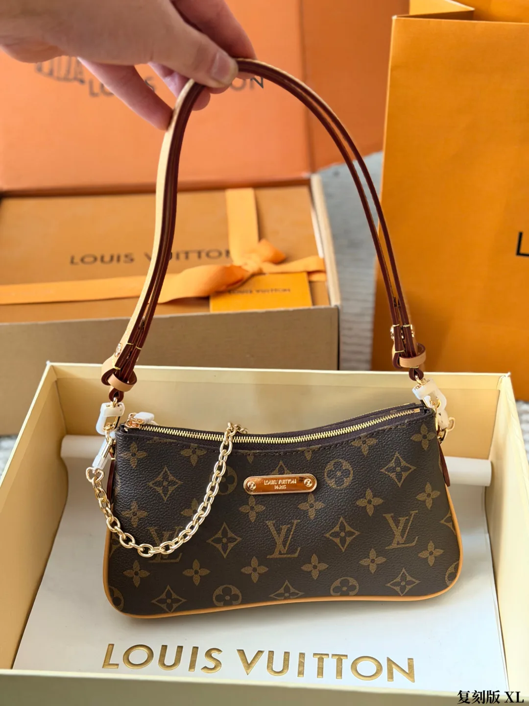 Louis Vuitton Cowhide Canvas Clutch in Brown · view 1