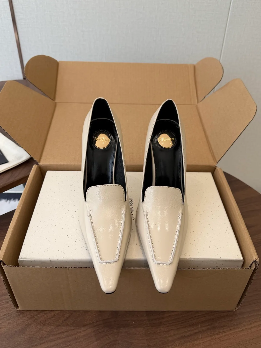 Saint Laurent Cowhide Smooth Pointed-Toe Pumps in Cream · view 1