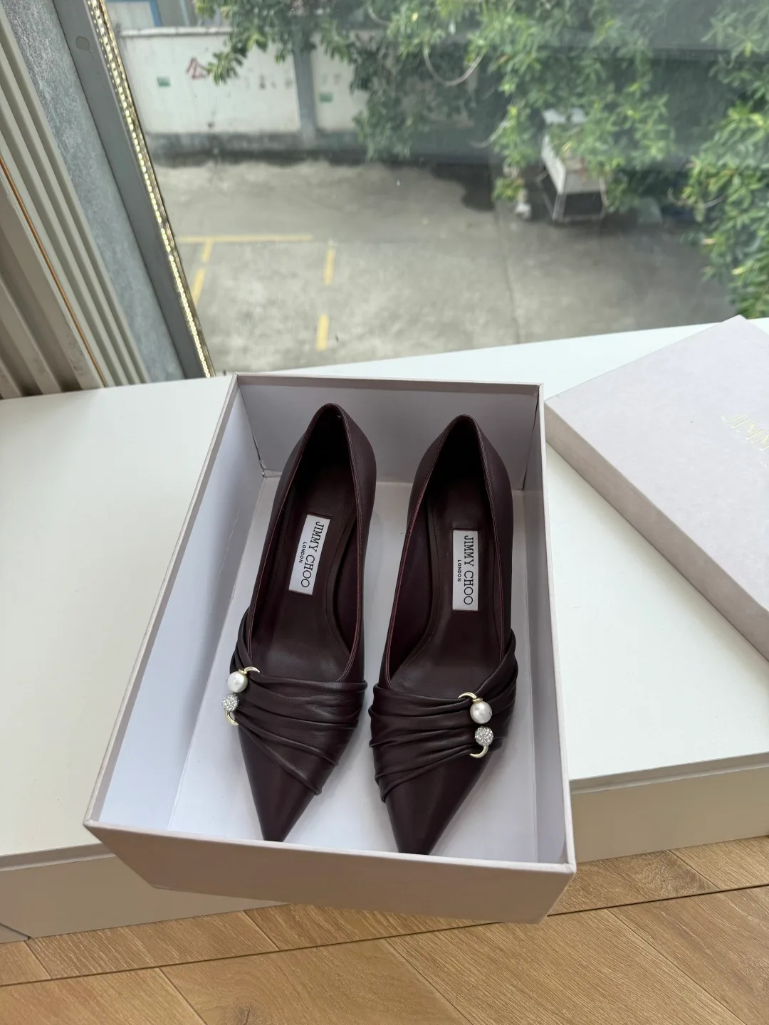 Jimmy Choo Pointed-Toe Bow Knotted Pointed Pumps in Brown · view 1