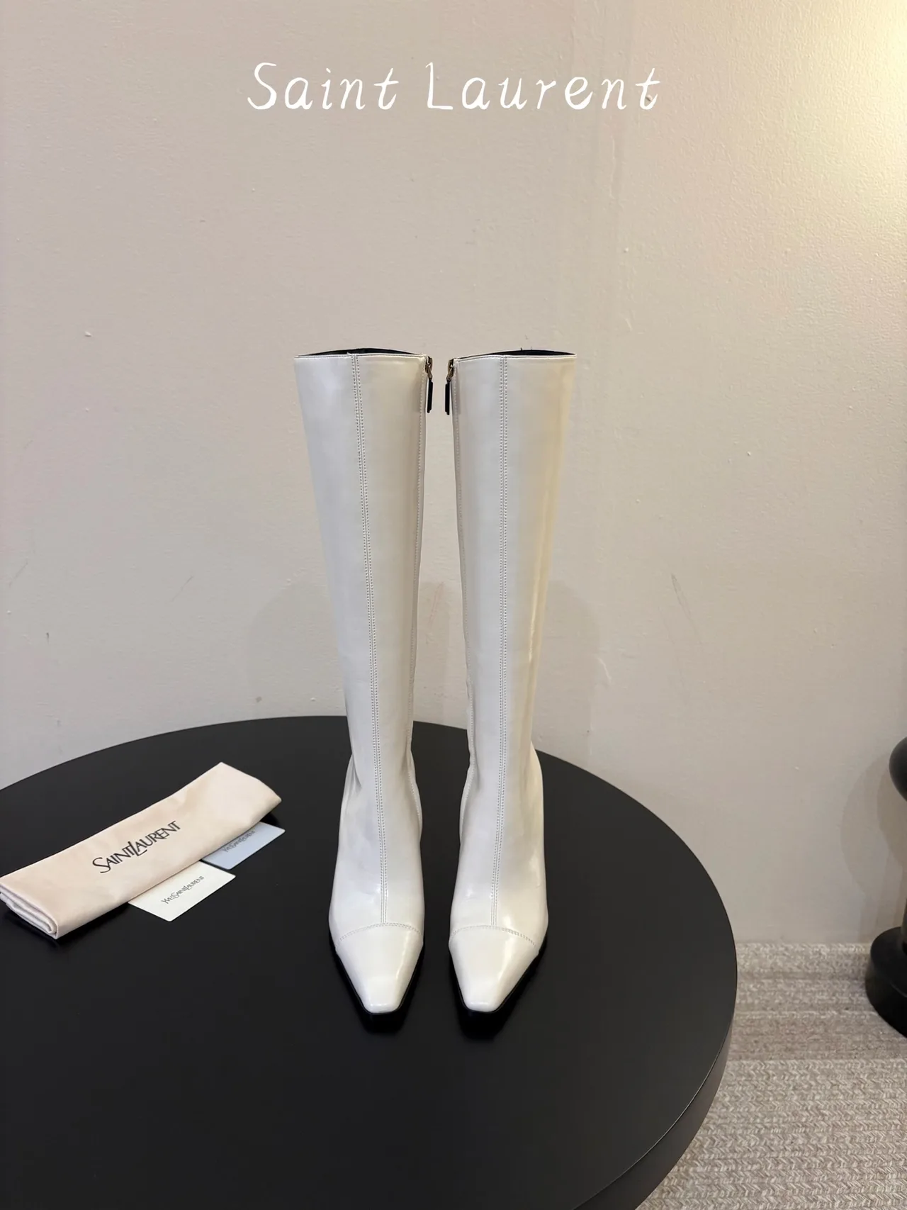 Saint Laurent Cowhide Sheepskin Knee-High Boots in White · view 1