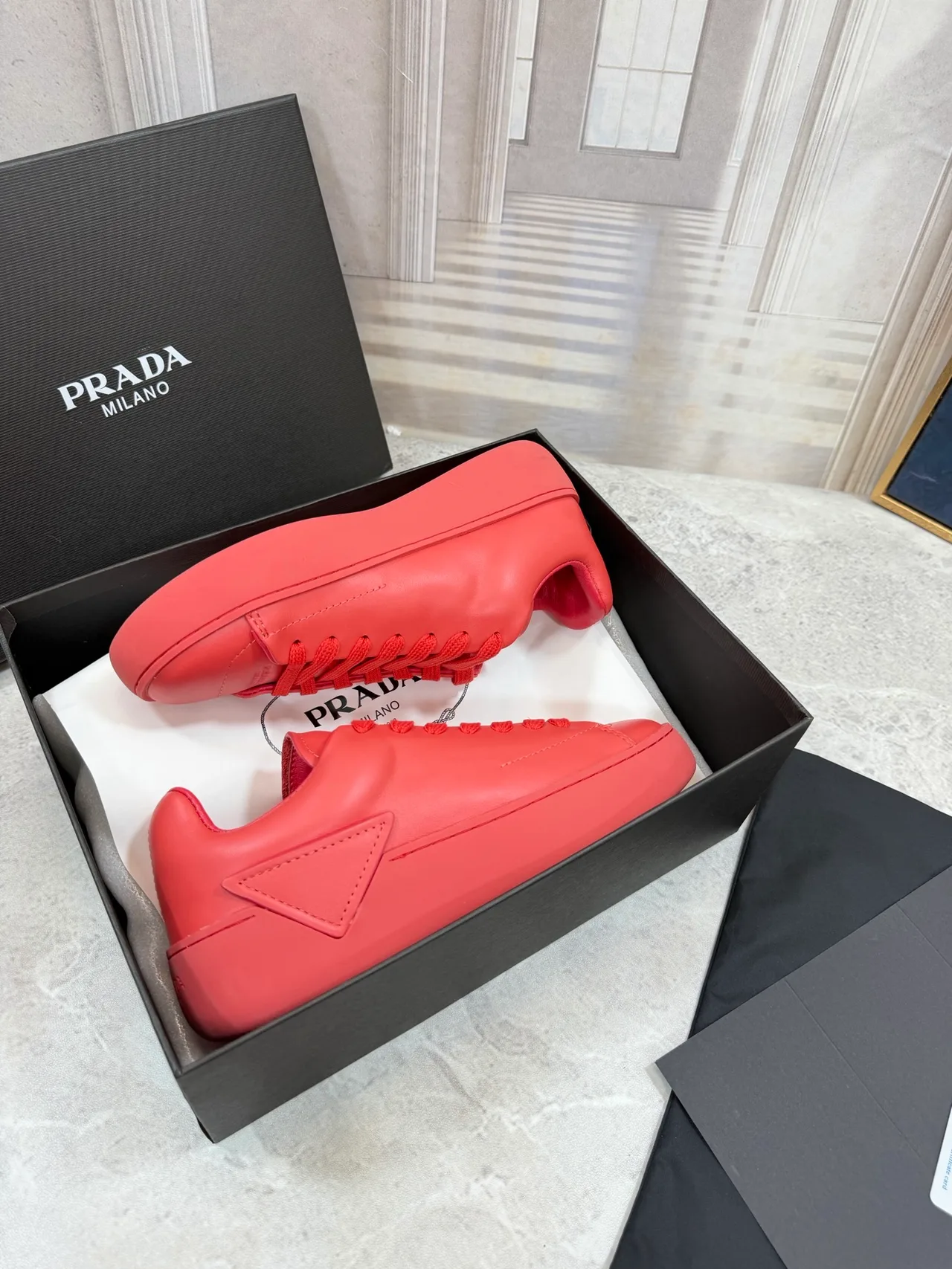 Prada Cowhide Round-Toe Low-Top Sneakers in Red · view 6