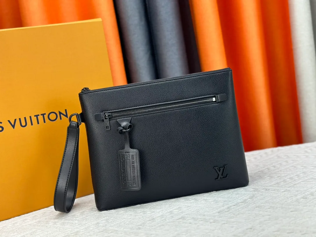 Louis Vuitton Cowhide Clutch in Black · view 1