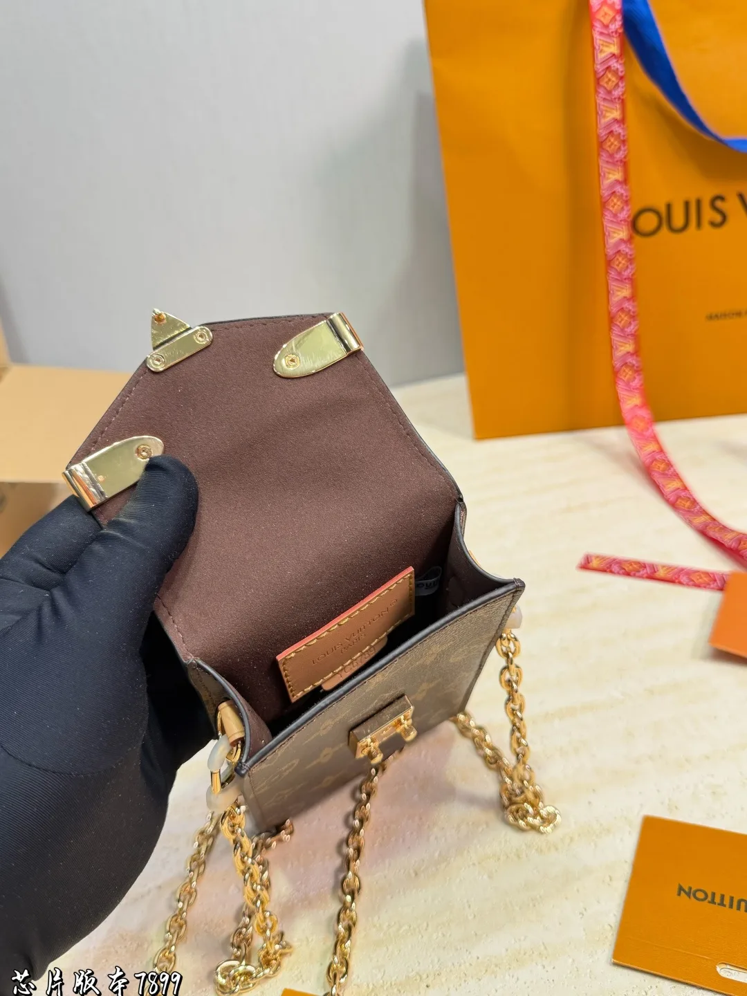 Louis Vuitton Phone Shoulder Pouch in Brown · view 9