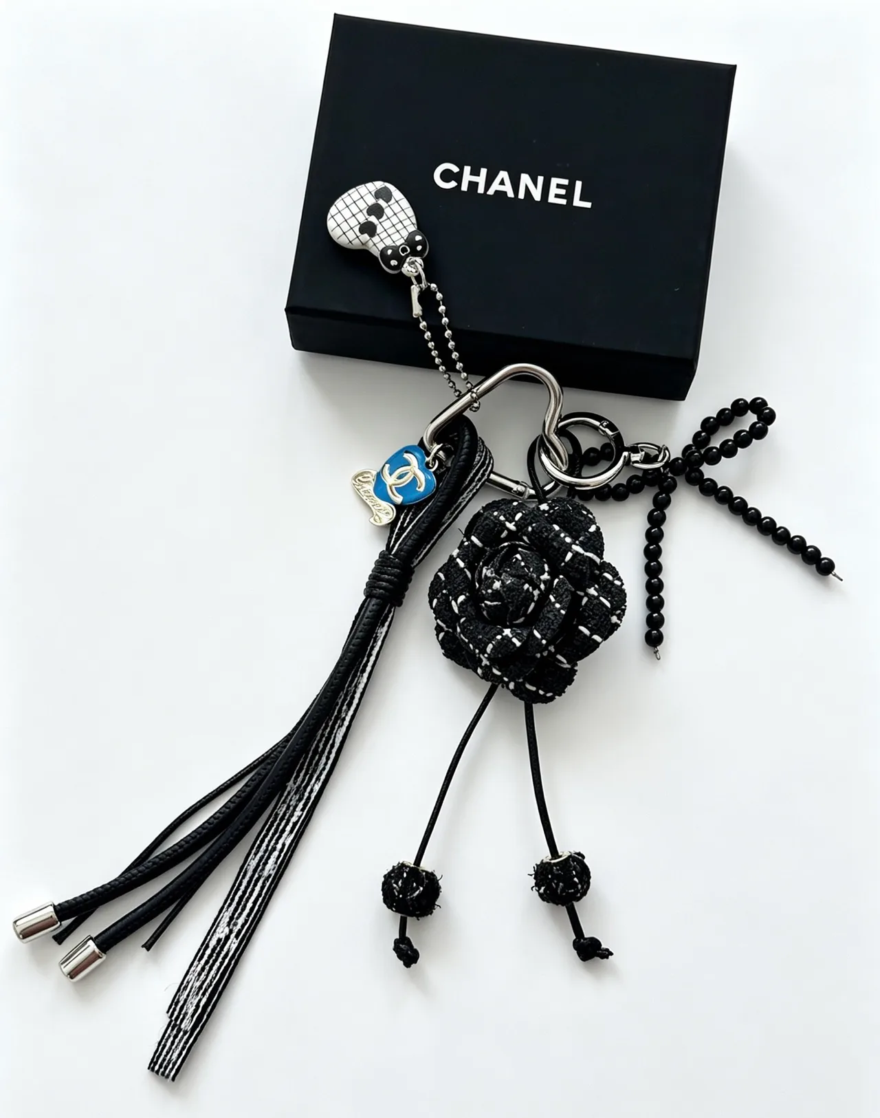 Chanel Woven Floral Tassel Keychain in Black · view 2