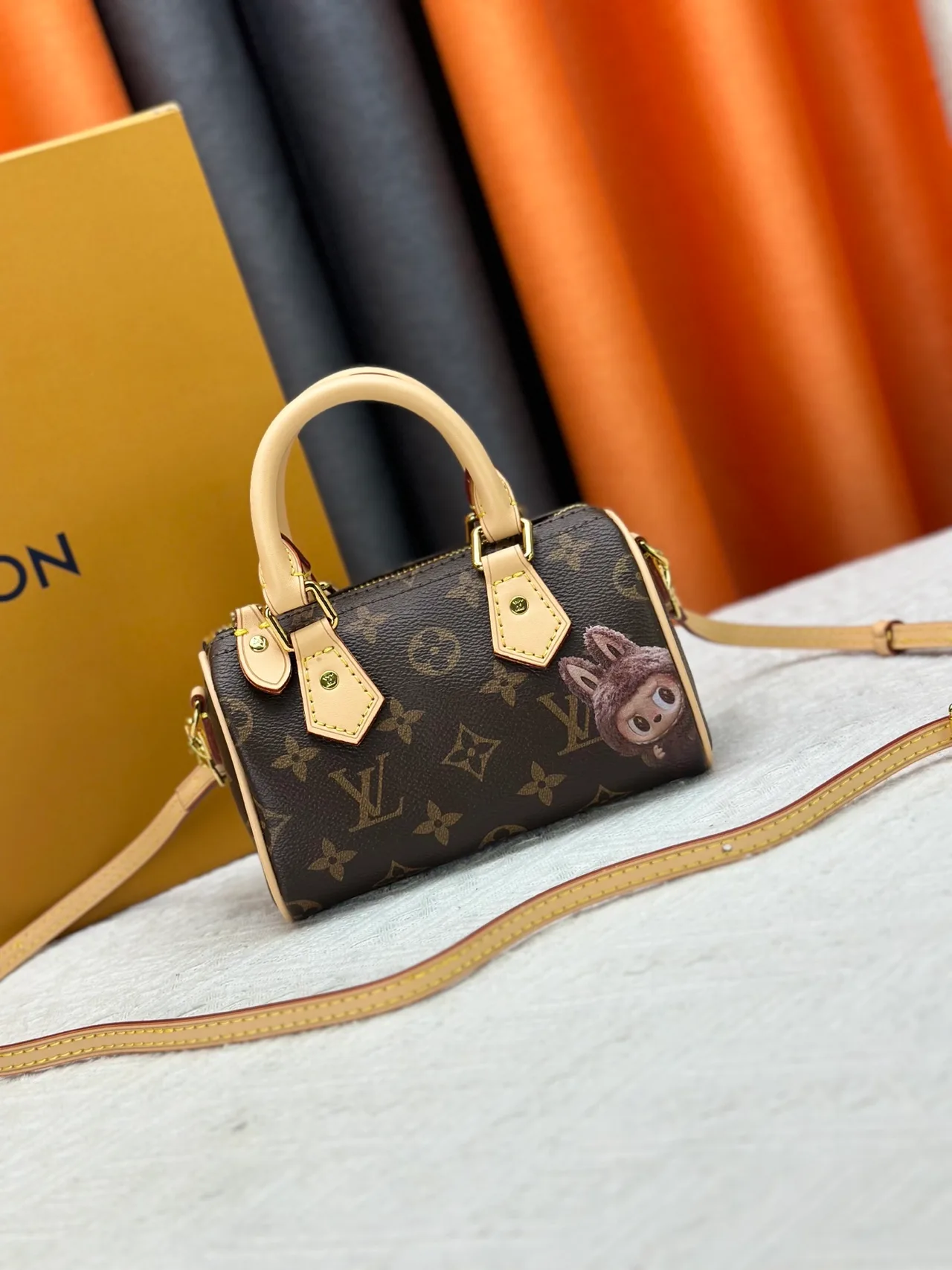 Louis Vuitton Leather Nano Speedy Handbag in Brown · view 1