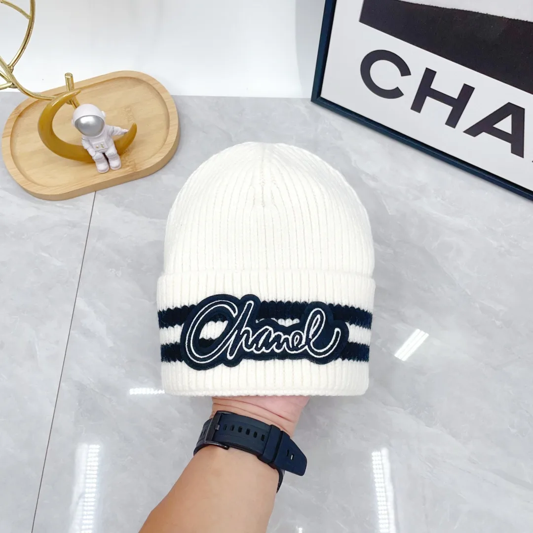 Chanel Striped Embroidered Beanie in White · view 7