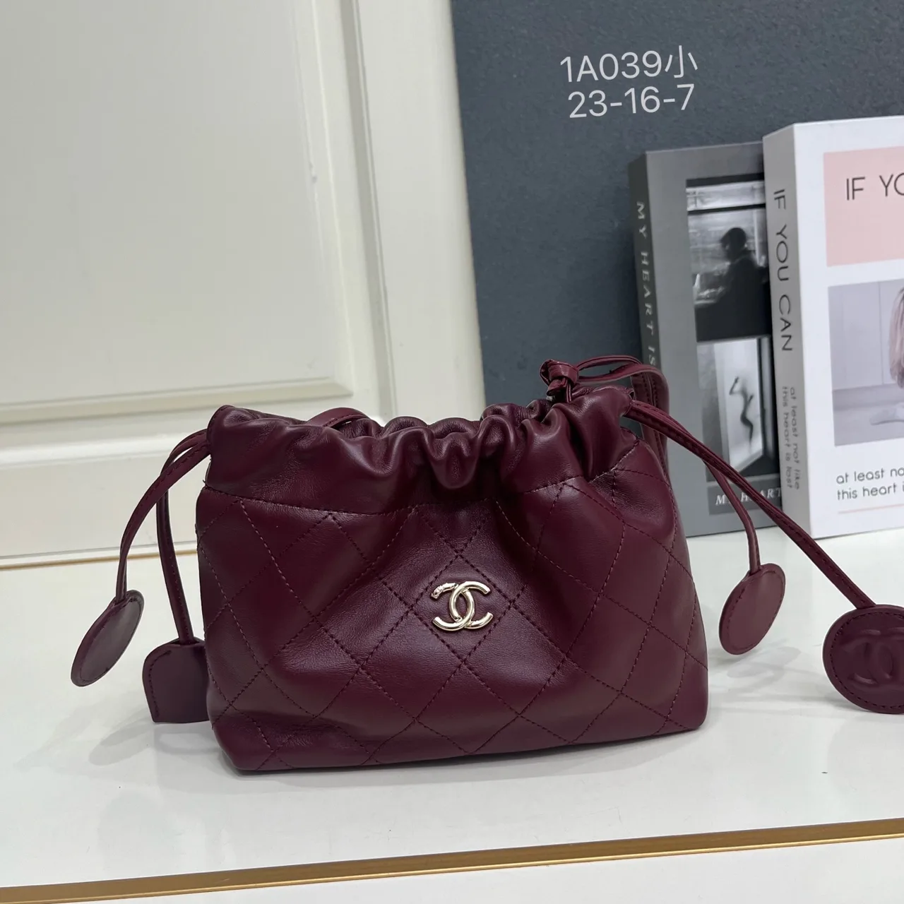 Chanel Quilted Crossbody Bag in Burgundy · view 1