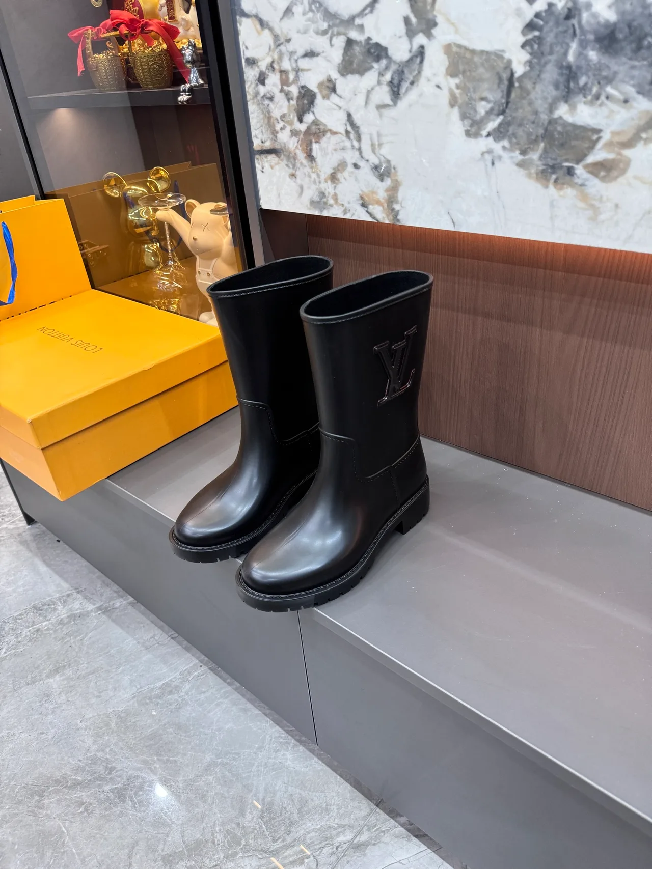 Louis Vuitton Glossy Mid-Calf Boots in Black · view 1