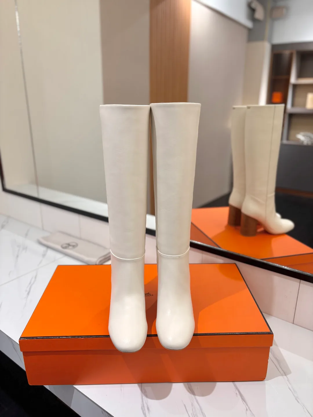 Hermes Cowhide Matte Round-Toe Knee-High Boots in White · view 3