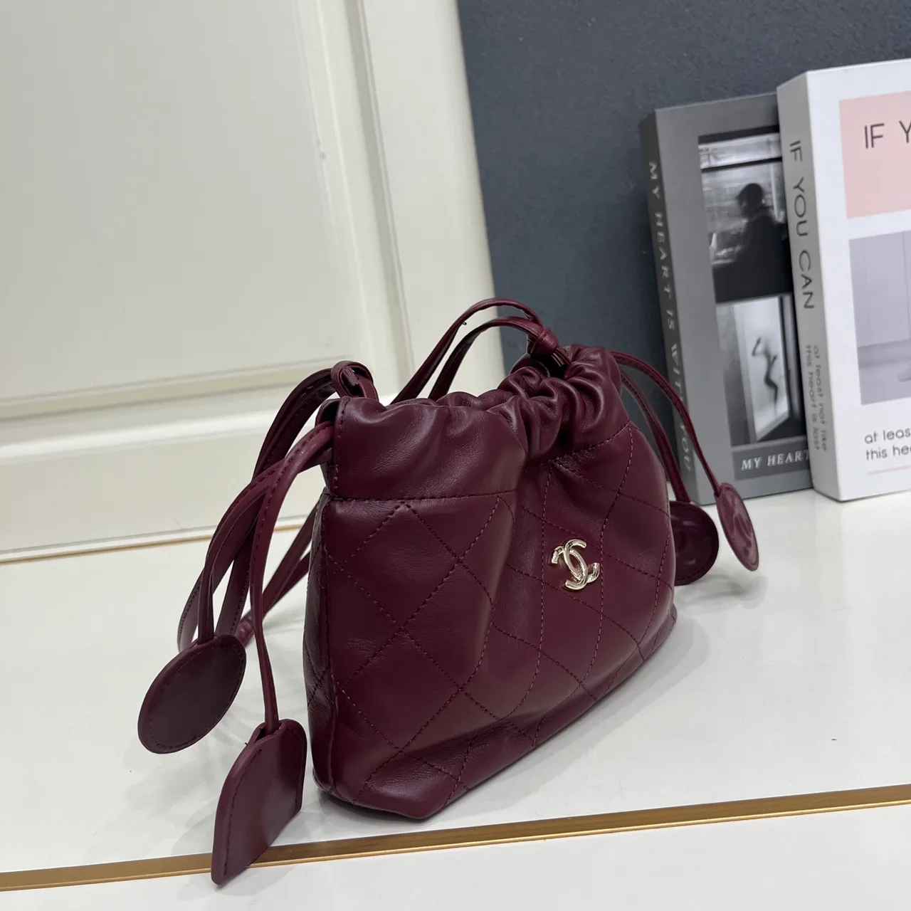 Chanel Quilted Crossbody Bag in Burgundy · view 3