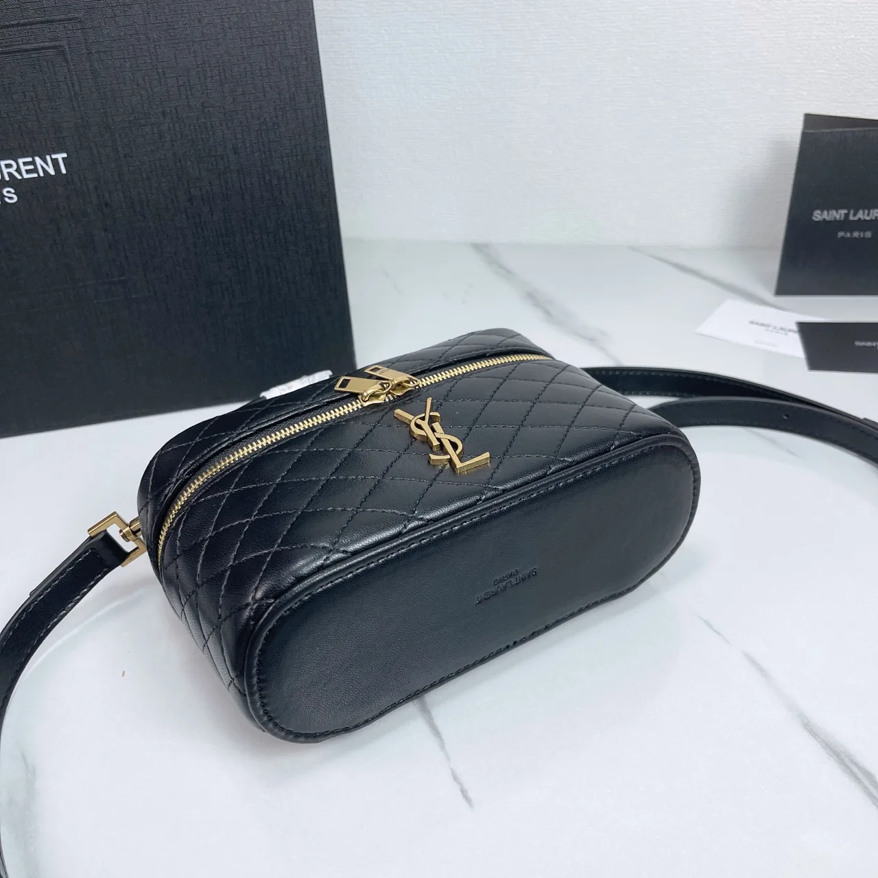 Saint Laurent Quilted Clutch in Black · view 4