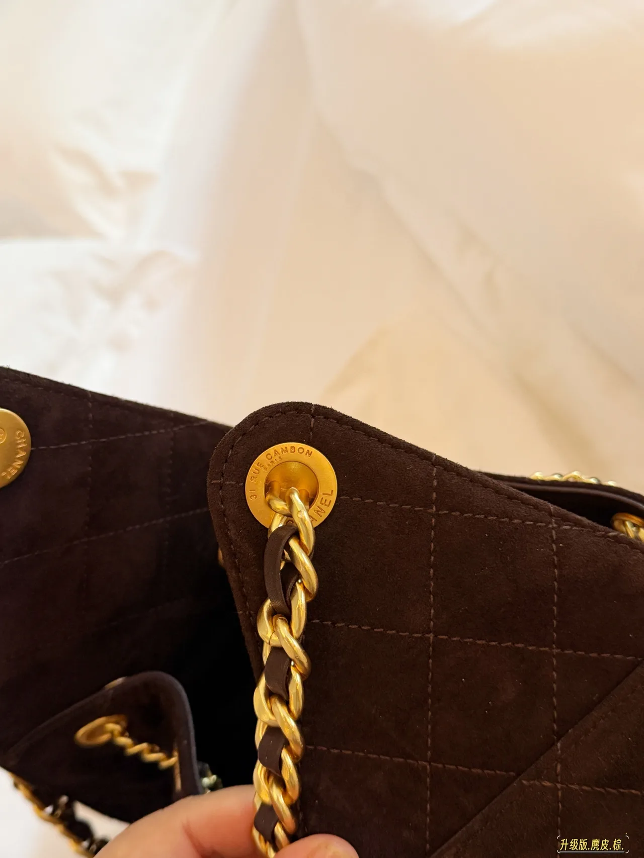 Chanel Quilted Bucket Bag in Brown · view 6