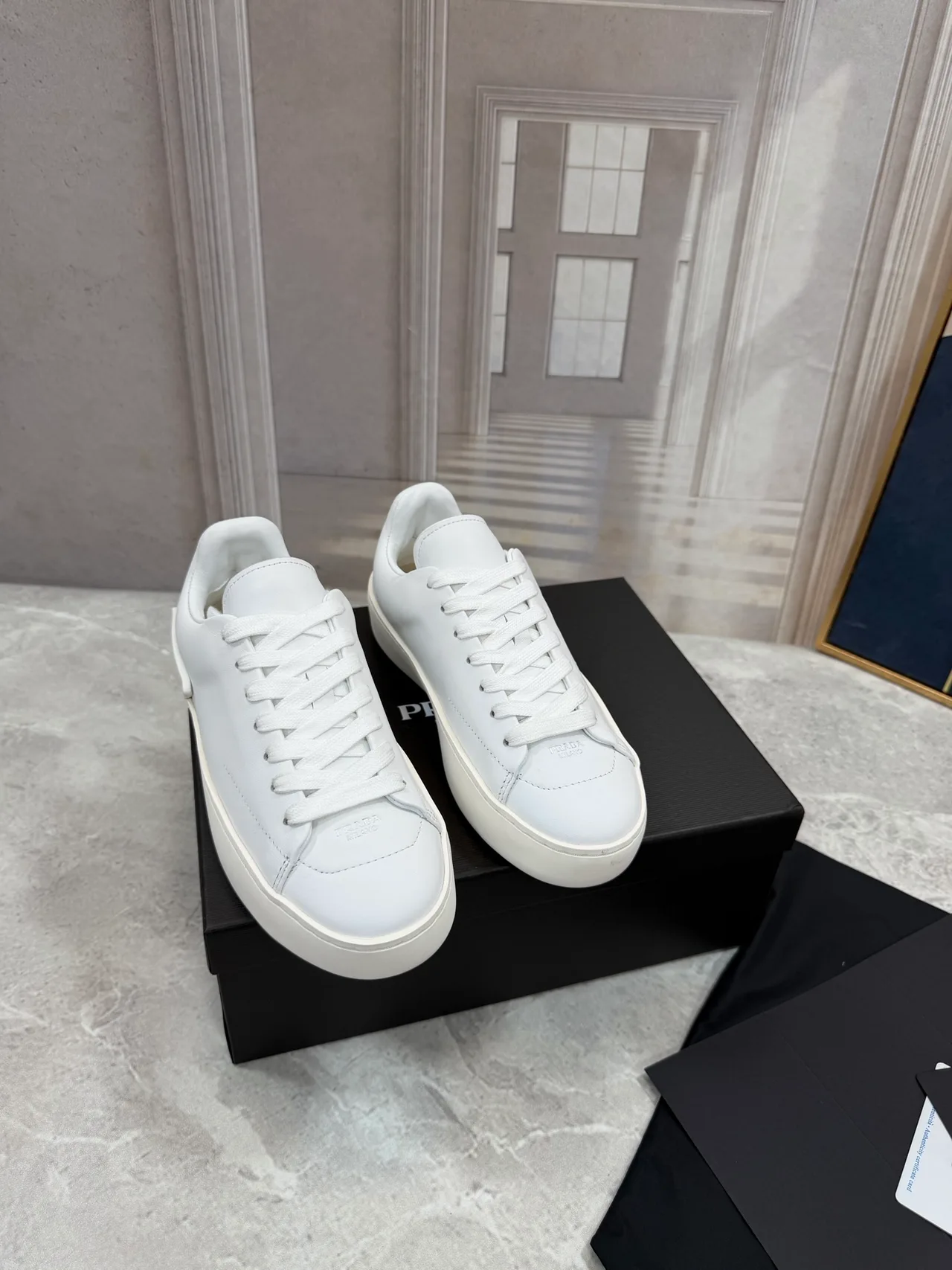 Prada Cowhide Smooth Low-Top Sneakers in White · view 1