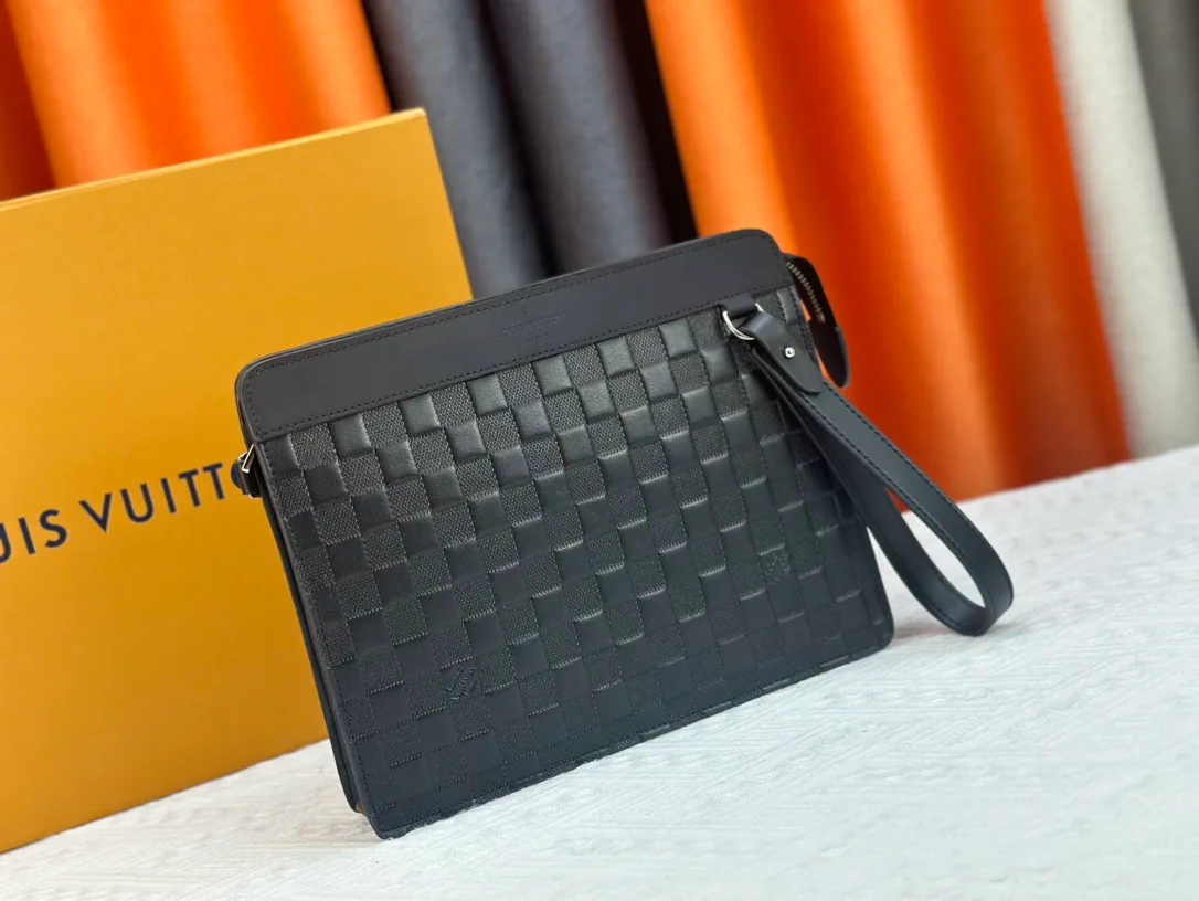 Louis Vuitton Canvas Woven Clutch in Black · view 2