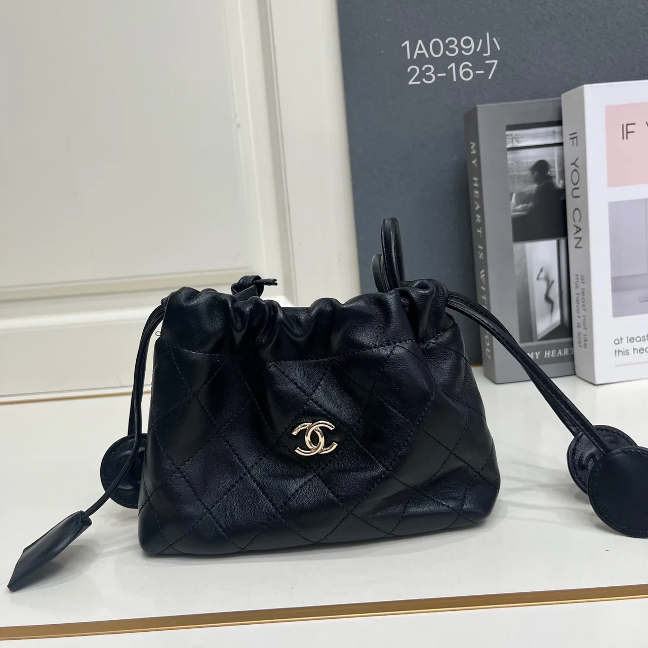 Chanel Quilted Glossy Crossbody Bag in Black · view 1