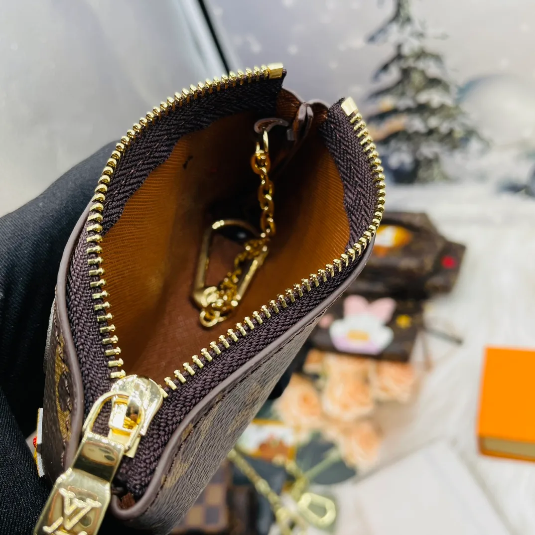 Louis Vuitton Cartoon Zip Pouch Keychain in Brown · view 3