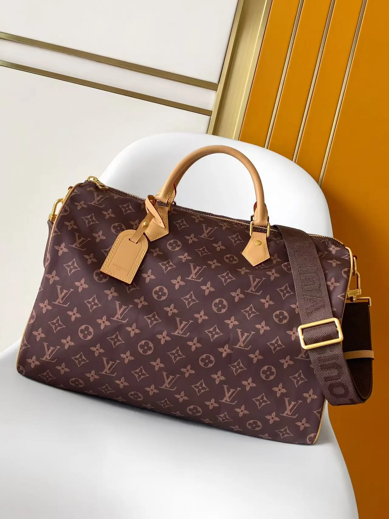 Louis Vuitton Canvas Monogram Glossy Duffel Bag in Brown · view 1