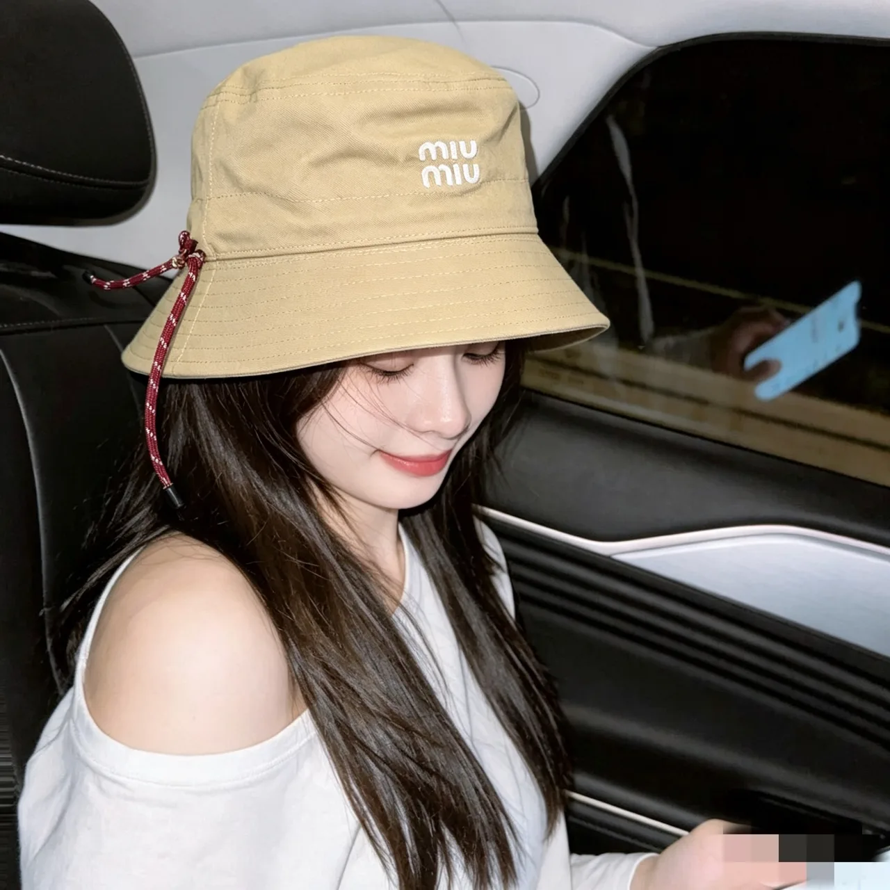 Miu Miu Bucket Hat in Beige · view 2