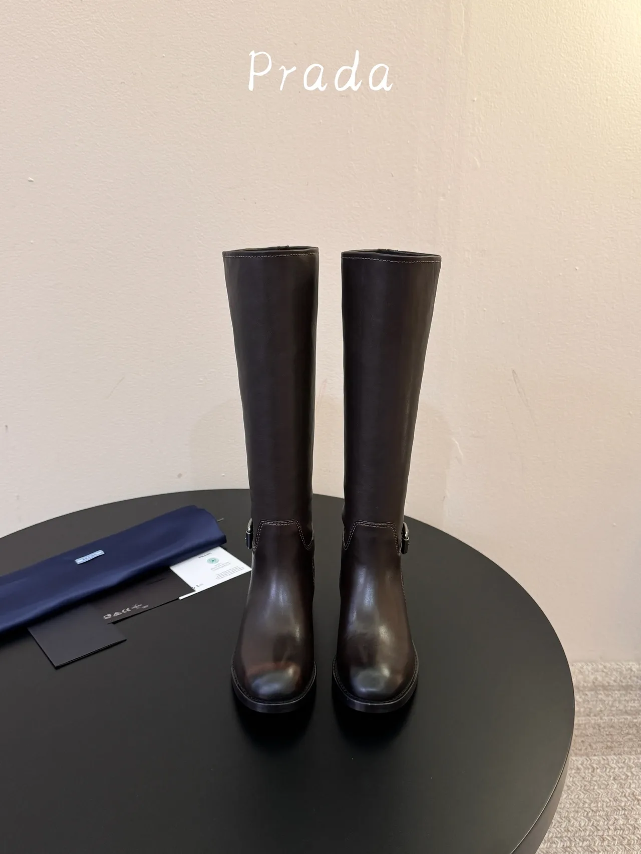Prada Cowhide Glossy Pointed-Toe Buckle Knee-High Boots in Brown · view 1