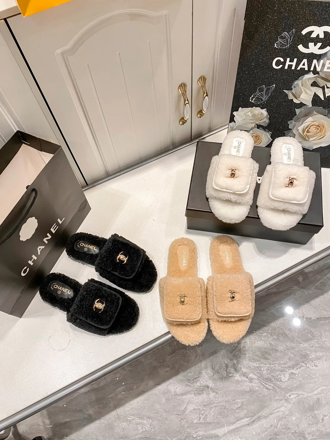 Chanel Faux-Fur Slippers in Black & White & Beige · view 1